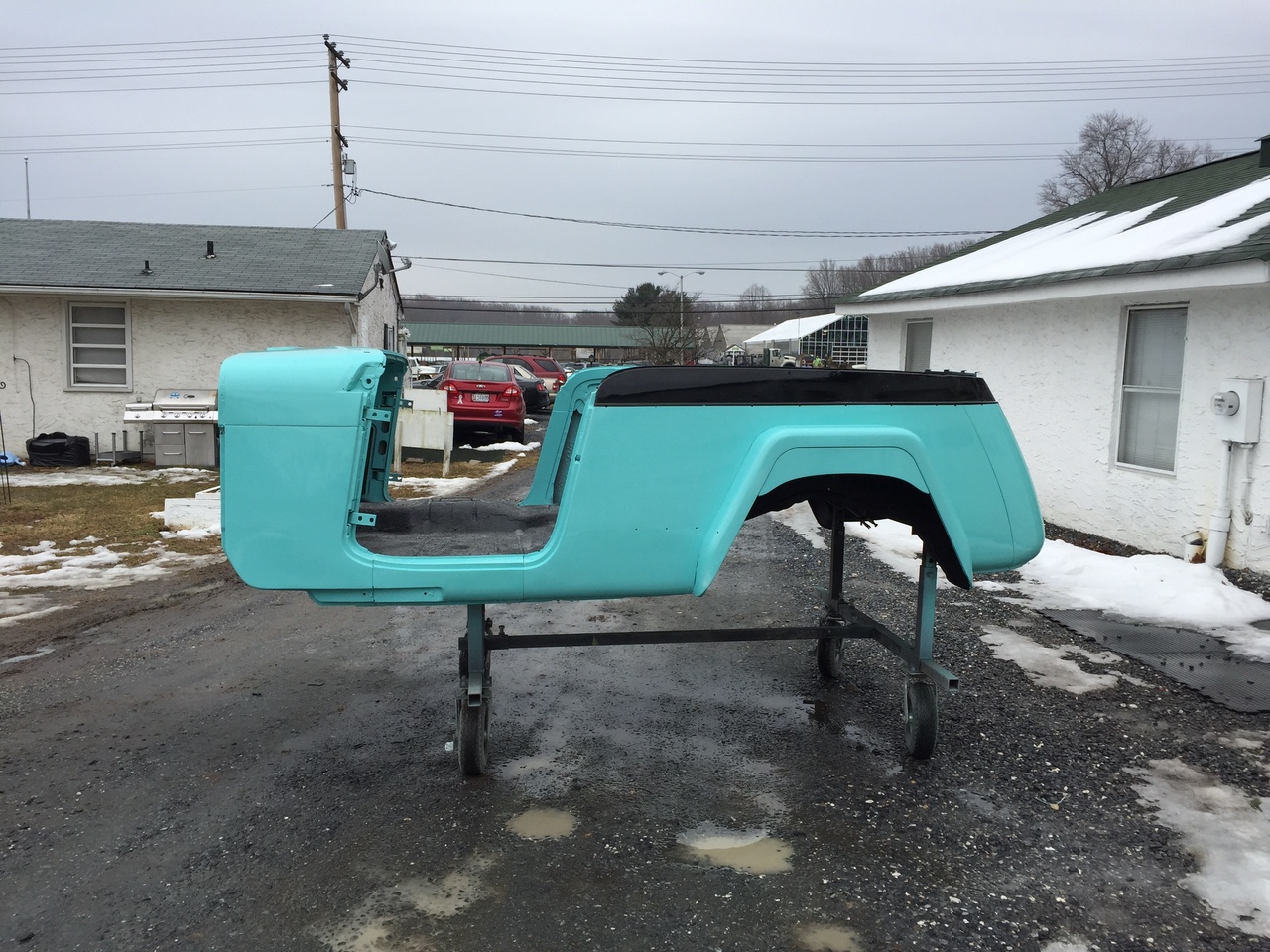 Jeepster rear panel
			  paint fresh coat of clear